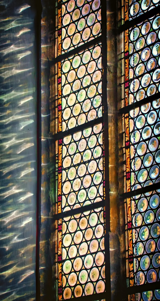 Stain Glass window with light coming through it